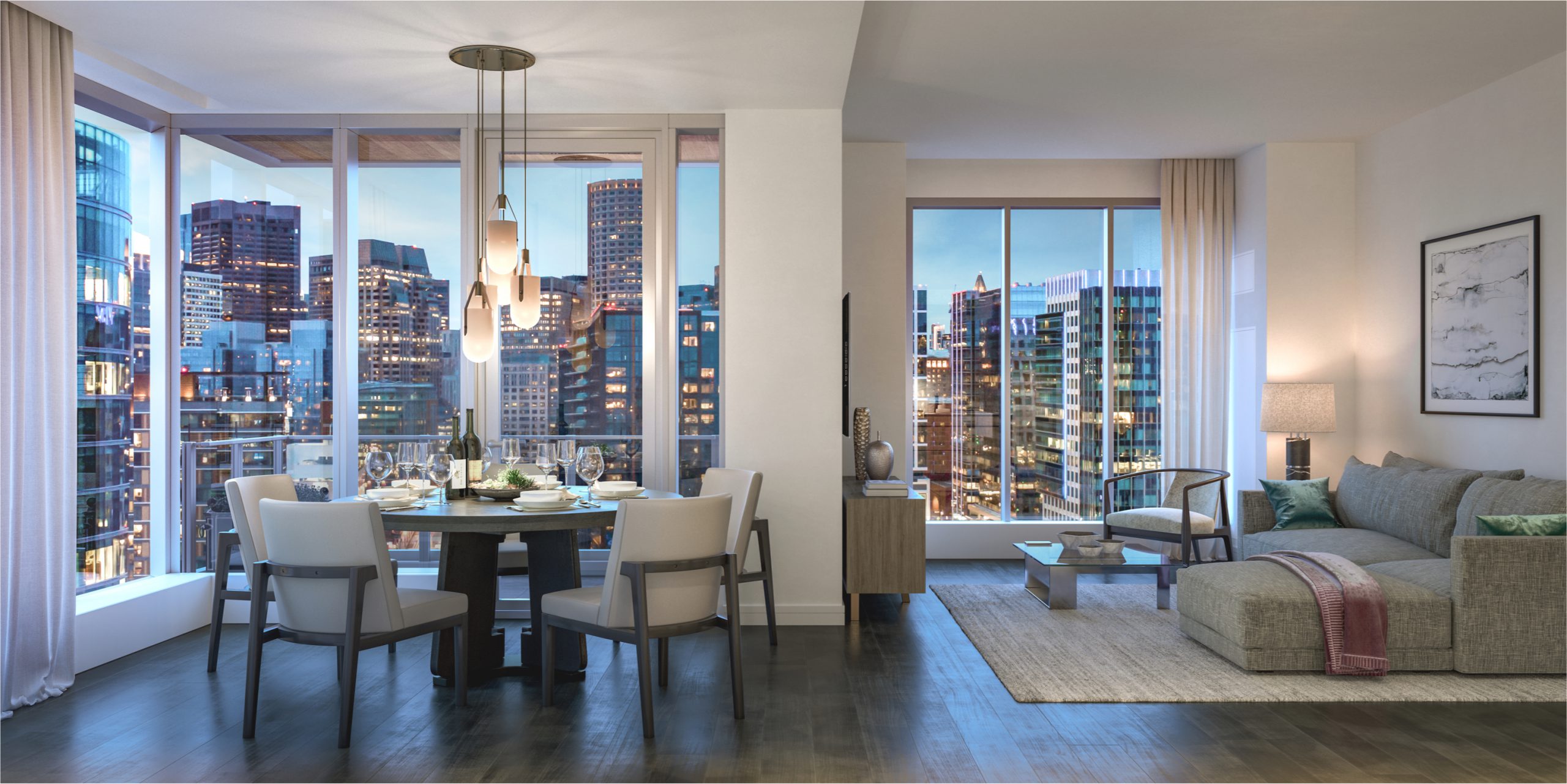 View of a living area at St. Regis Boston, The Residences. Boston City is visible through the windows.